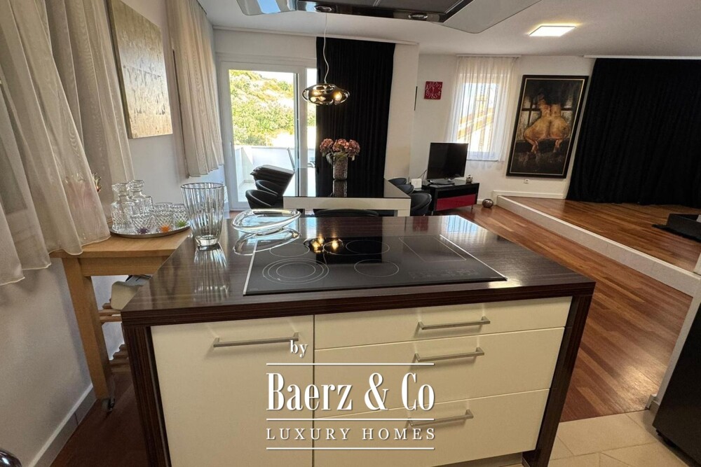 Brač, Bol, luxury penthouse in the town centre and building plot with building permit image