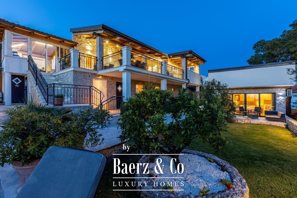 Rogoznica, a beautiful villa with a pool, a view of the sea and a hidden garden image