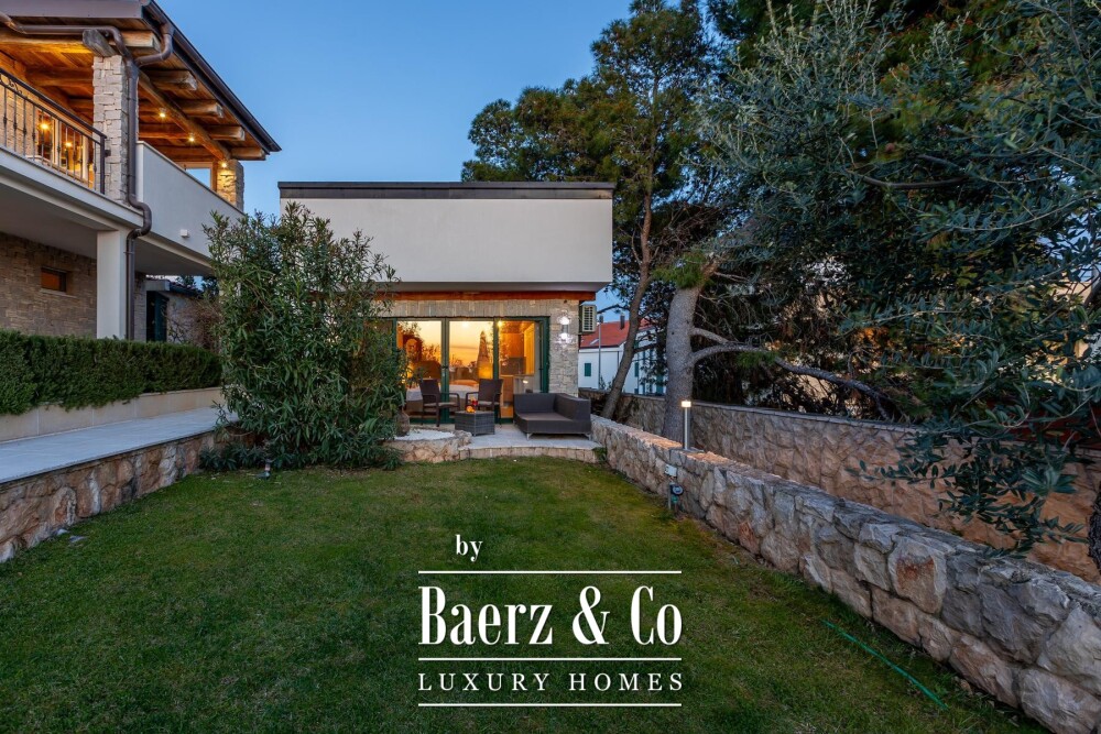 Rogoznica, a beautiful villa with a pool, a view of the sea and a hidden garden image