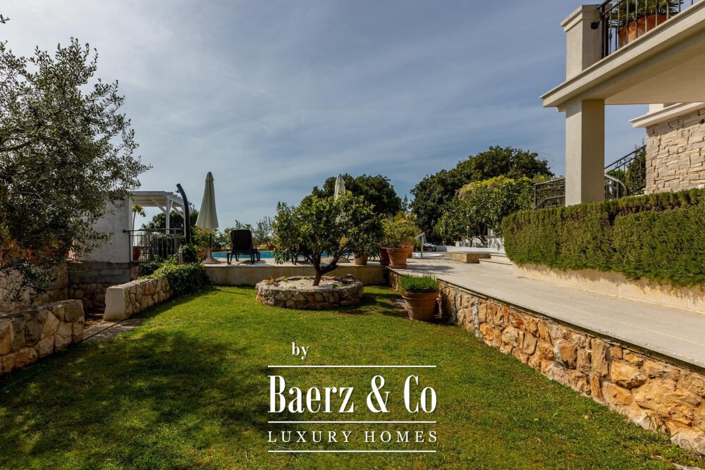 Rogoznica, a beautiful villa with a pool, a view of the sea and a hidden garden image