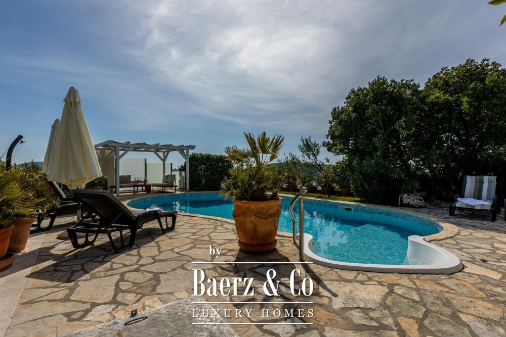 Rogoznica, a beautiful villa with a pool, a view of the sea and a hidden garden image