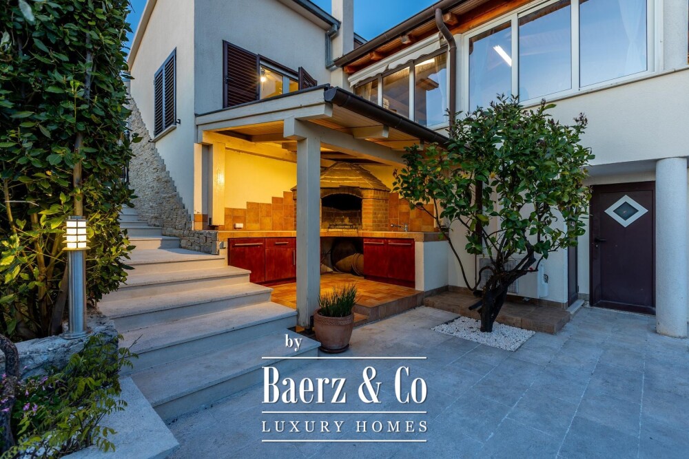 Rogoznica, a beautiful villa with a pool, a view of the sea and a hidden garden image