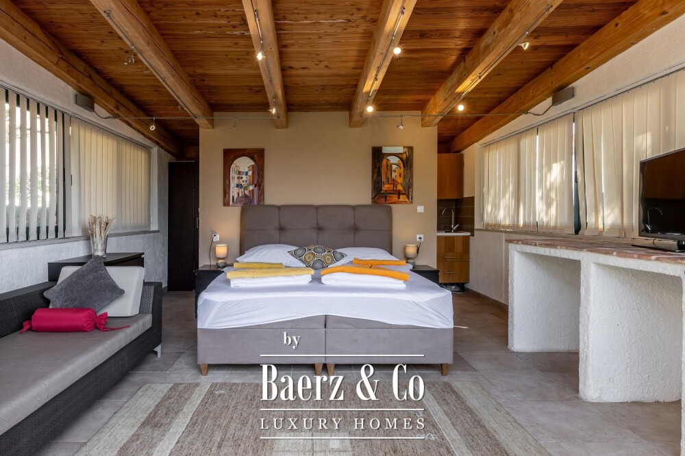 Rogoznica, a beautiful villa with a pool, a view of the sea and a hidden garden image