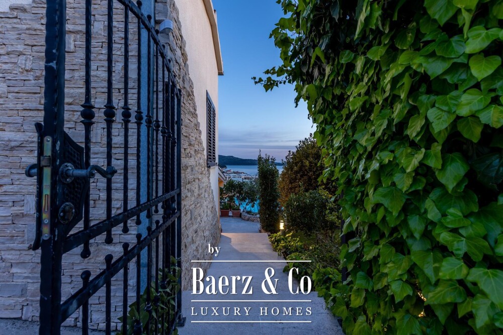Rogoznica, a beautiful villa with a pool, a view of the sea and a hidden garden image