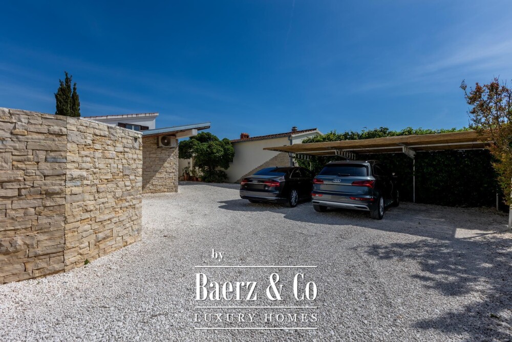 Rogoznica, a beautiful villa with a pool, a view of the sea and a hidden garden image