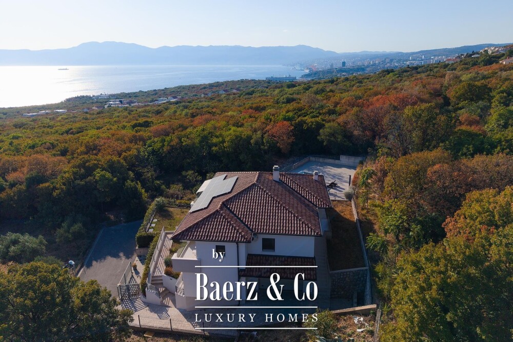 Kostrena, a house with a swimming pool and a stunning open sea view image
