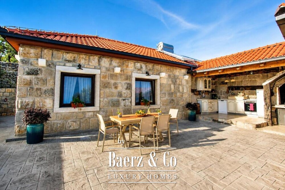 Trogir area, stone villa with a swimming pool and a Mediterranean garden image