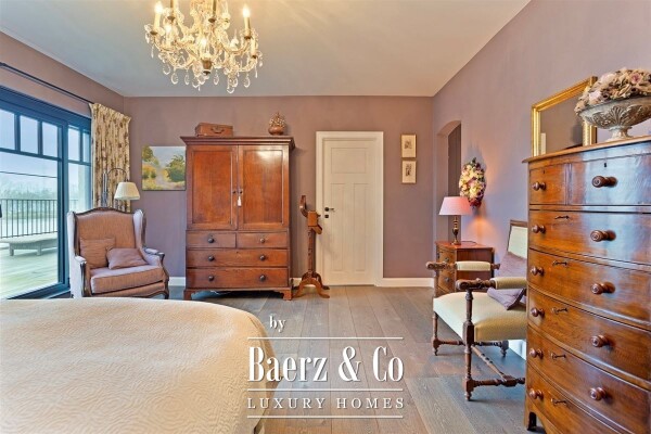 photo 24 Uitzonderlijke Duplex met zicht op kanaal, garage, carport en ruime (wijn)kelder!