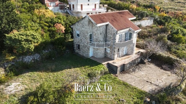 photo 1 House with a Plot in a Premium Location for Renovation